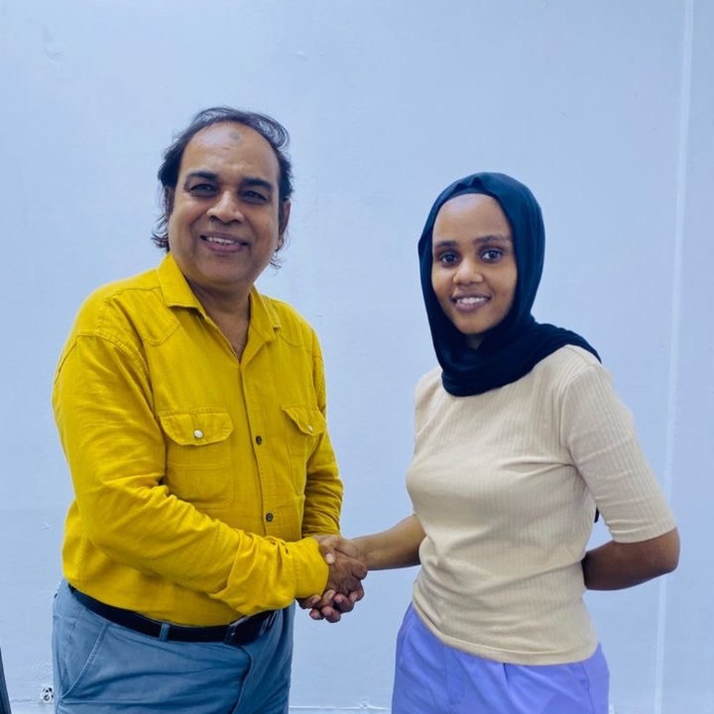 With a local counterpart, Dar es Salaam
